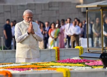 Prime Minister Narendra Modi paying tribute to Mahatma Gandhi at Raj Ghat