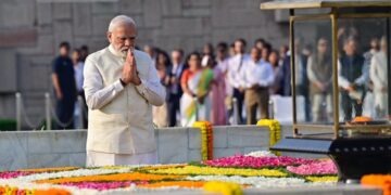 Prime Minister Narendra Modi paying tribute to Mahatma Gandhi at Raj Ghat
