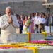Prime Minister Narendra Modi paying tribute to Mahatma Gandhi at Raj Ghat