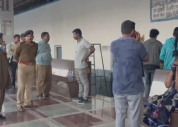 Police officials at Done railway station after GRP constable death