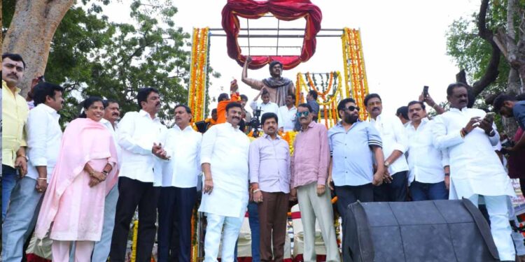 superstar krishna statue unveiled at vijayawada lenin center as film and political leaders pay tribute to the legendary actor.