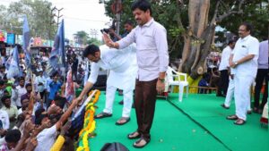 superstar krishna statue unveiled at vijayawada lenin center as film and political leaders pay tribute to the legendary actor.