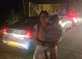 woman police constable wins praise after clearing traffic in samarlakota while holding her child in andhra pradesh Lady constable traffic video goes viral in Samarlakota Andhra Pradesh
