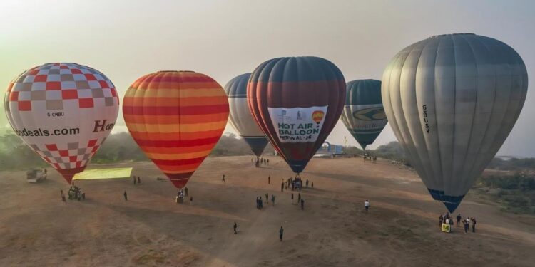 hot air balloon festival starts near golconda fort as minister jupally krishna rao enjoys a scenic balloon ride in hyderabad.