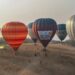 hot air balloon festival starts near golconda fort as minister jupally krishna rao enjoys a scenic balloon ride in hyderabad.