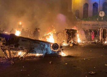 iran faces deadly protests as trump warns of us military action. iran threatens retaliation amid economic collapse and unrest.