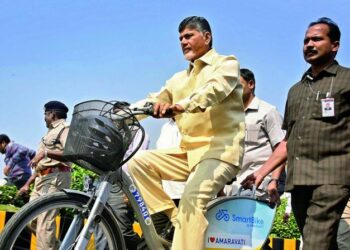 Chandrababu Naidu riding an e-cycle during Guinness record rally in Kuppam Chittoor district