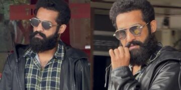 jr ntr new look grabs attention as the star is spotted at shamshabad airport amid dragon movie shooting updates.
