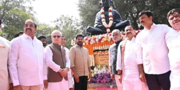 Telangana leaders offering floral tributes to Mahatma Gandhi at Bapu Ghat Hyderabad