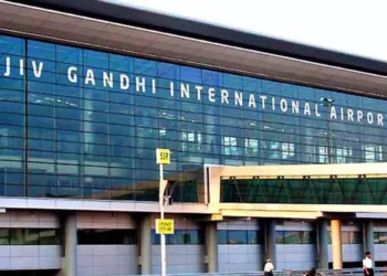 Security personnel inspecting aircraft at Rajiv Gandhi International Airport