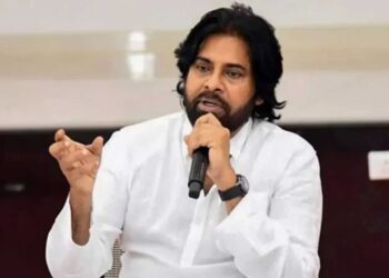 “Pawan Kalyan with orphaned children in Pithapuram receiving financial support”