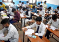 Students entering AP Intermediate exam centre under CCTV surveillance