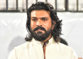 Ram Charan with Tollywood dancers during health insurance scheme launch