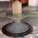 Dhana Shiva Lingam made with ten rupee coins by Sai Teja