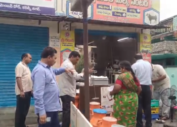 Food safety officials inspecting milk in Kakinada, Andhra Pradesh