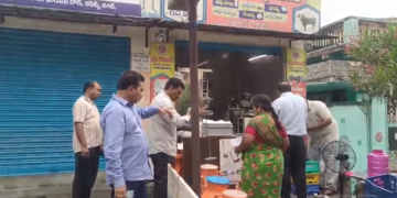 Food safety officials inspecting milk in Kakinada, Andhra Pradesh
