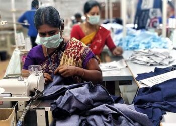 Women learning tailoring skills at a workshop in Capital Region