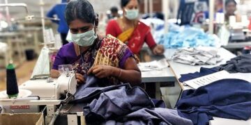 Women learning tailoring skills at a workshop in Capital Region