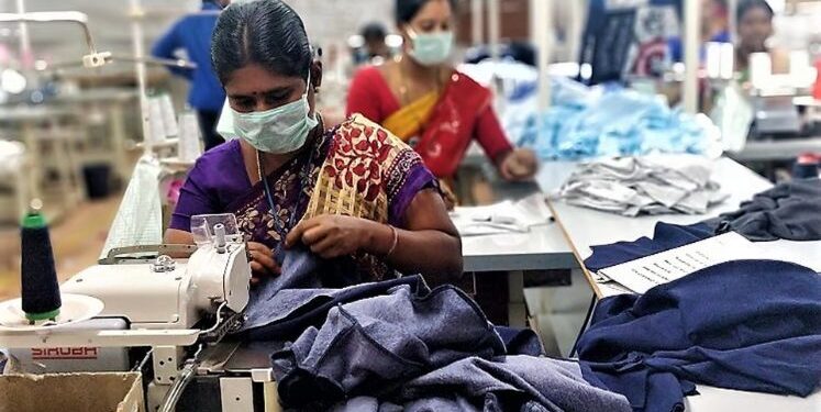 Women learning tailoring skills at a workshop in Capital Region
