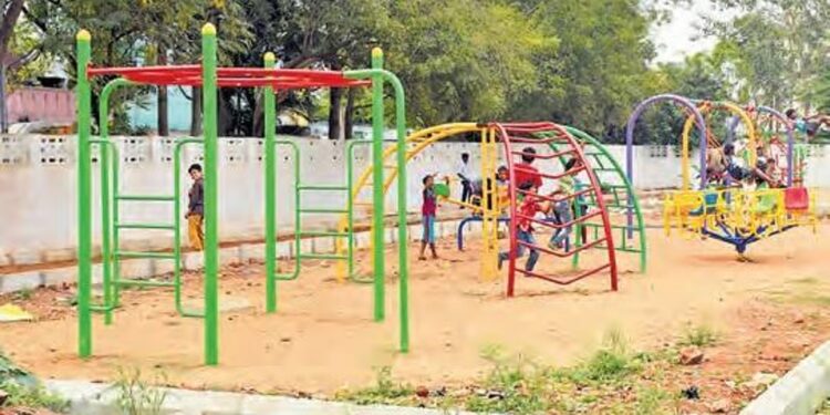 Modern walking track and open gym equipment at a Vijayawada city park
