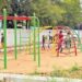 Modern walking track and open gym equipment at a Vijayawada city park