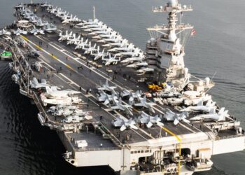 US deploys USS Gerald R. Ford to the Middle East, joining USS Abraham Lincoln amid rising Iran tensions and ongoing nuclear talks in Oman.