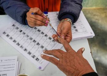 Voters casting ballots at municipal election polling station 2026