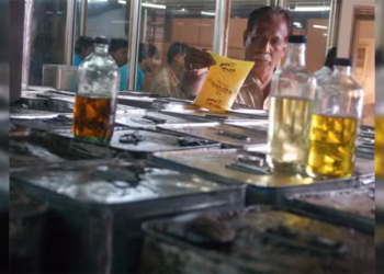 Authorities inspecting seized adulterated oil in Eluru hotels