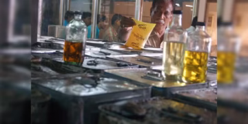 Authorities inspecting seized adulterated oil in Eluru hotels