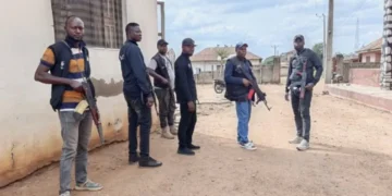 Aftermath of Kwara State terrorist attack showing destroyed homes and burned shops