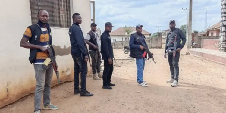 Aftermath of Kwara State terrorist attack showing destroyed homes and burned shops